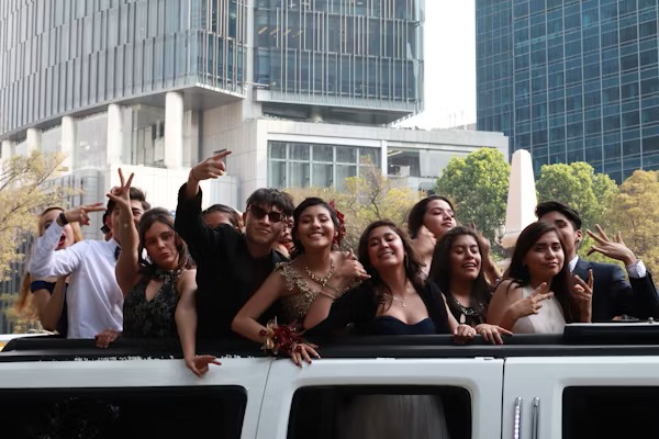 Happy customers enjoying luxury limousine service from www.transportcenterhub.pro during a memorable event.