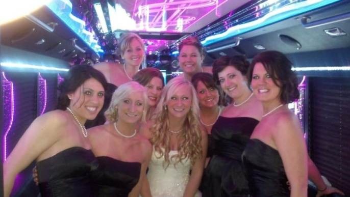 Happy customers enjoying luxury limousine service from www.transportcenterhub.pro in a memorable experience.