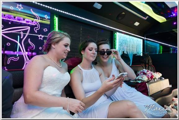 Happy customers enjoying luxury limousine service from www.transportcenterhub.pro during a memorable event.